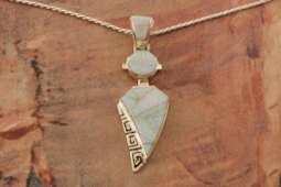 Calvin Begay Fire and Ice Opal Sterling Silver Kachina Pendant